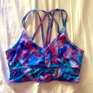 Born primitive pink and blue rain drop sports bra